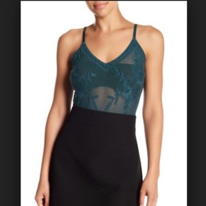 Honey Punch Lace Bodysuit in Green.
